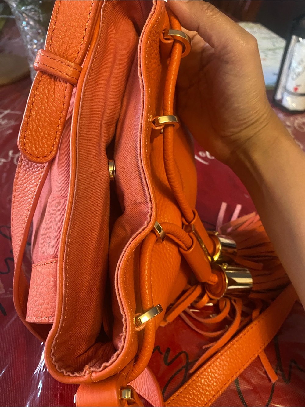 See By Chloé Orange Pebbled Leather Mini Bucket Bag with Tassels - Picture 15 of 15